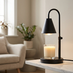 Lumio candle warmer lamp melting a cream candle on a marble shelf