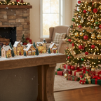 Lighted village set displayed on a console table near a Christmas tree