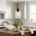 Foundry Glass Pendant Light hanging above a kitchen island