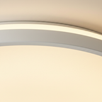 Close-up of the slim white frame and frosted diffuser
