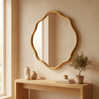 Asha Irregular Wall Mirror hung above an entryway console table
