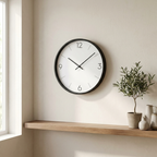Quiet Modern Wall Clock mounted on a living room wall