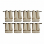 Lumiere blackout linen curtain panels folded on a white studio background